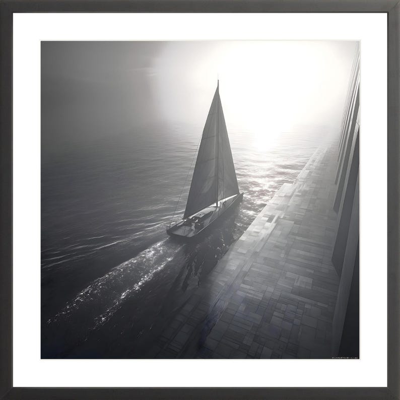 May include: Black and white framed print of a sailboat on the water. The sailboat is sailing towards the sun, with a large wall on the right side of the image. The image is framed in a black frame.