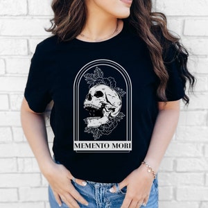 Memento Mori Symbol Shirt, Stylish Philosophical Tees, Reflective Fashion Statements, Skull Roses, Remember to Die Stoicism Arch Design