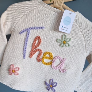 Personalised hand embroidered knitted children, baby name cardigan. Cream - Multiple colours