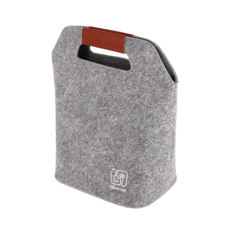 May include: A grey felt lunch bag with a brown leather handle. The bag has a rectangular shape with a cutout handle at the top. A white logo with a fork and spoon is visible on the front of the bag.