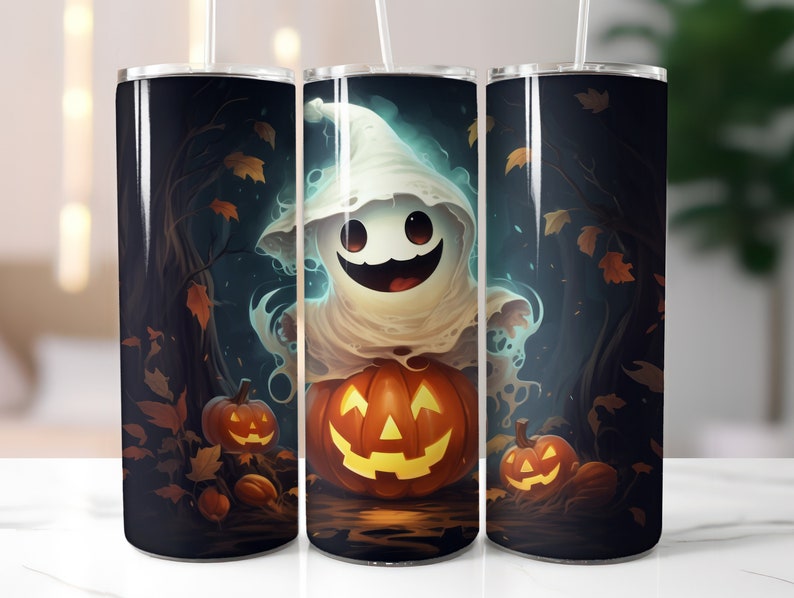 May include: A stainless steel tumbler with a Halloween theme. The design features a friendly ghost holding a jack-o'-lantern. The background is a dark forest with autumn leaves.