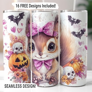 May include: Three white insulated tumblers with Halloween-themed designs. Each tumbler features a cartoon squirrel with a pink bow, bats, pumpkins, skulls, and the text "16 FREE Designs Included!" and "SEAMLESS DESIGN!"