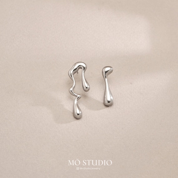 Orecchini in argento placcato oro design ondulato