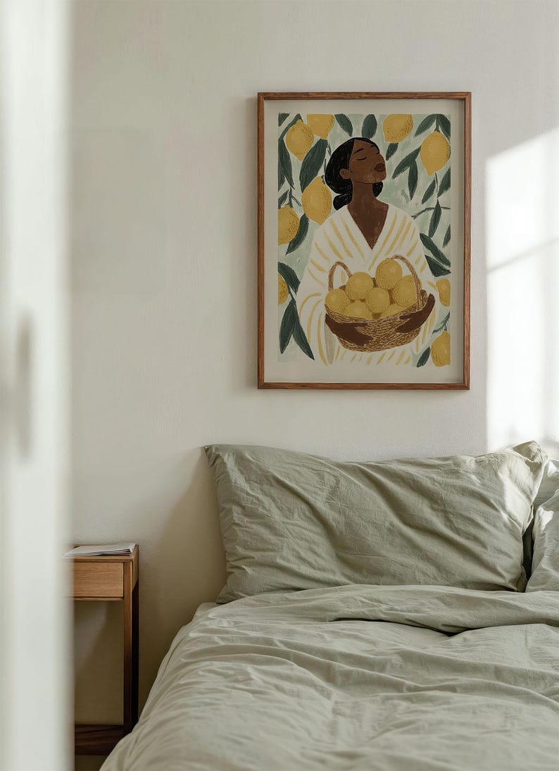 May include: A framed illustration of a person standing in a lemon tree, holding a basket of lemons. The person is wearing a white and yellow striped shirt. The background is a green and yellow lemon tree.