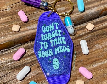 Don’t Forget To Take Your Meds Glow-In-The-Dark Resin Motel Keychain