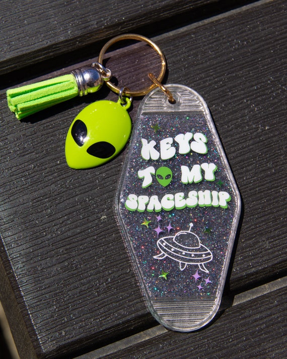 Glow in the dark alien keychain hot sale