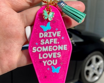 Drive Safe, Someone Loves You glow-in-the-dark Resin Motel Keychain
