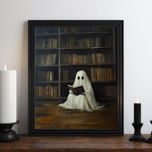 May include: A painting of a white ghost sitting in a library, reading a book. The ghost has two black eyes and is wearing a white sheet. The library is filled with bookshelves and books.