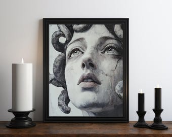 May include: A black framed canvas print of a woman's face with snakes for hair. The woman's eyes are closed and she is looking up. The background is white.