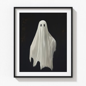 Peut inclure: Un fant&ocirc;me blanc avec deux yeux noirs sur un fond sombre.