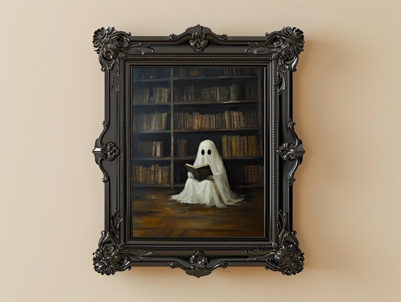 May include: A framed painting of a white ghost reading a book in a library. The ghost is wearing a white sheet and has two black eyes. The library shelves are filled with books.