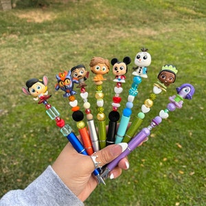 Doorable pens, crafts, pens, Disney doorables , Disney characters, cute beaded pens