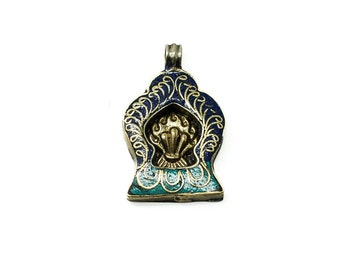 Pendentif tibétain porte bonheur fait à la main au Népal.