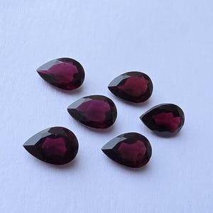 Gema de granada AAA+: formato de gota/pera, lapidação facetada