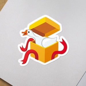 Sus duckie gift sticker, cute duck in a gift box, whimsical funny meme stickers, water resistant matte bottle sticker, laptop sticker
