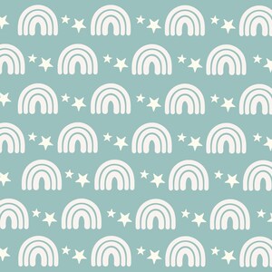 May include: A seamless pattern featuring white rainbows and white stars on a light blue background.