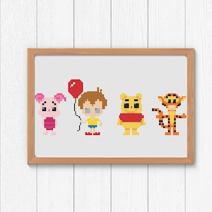 May include: Cross-stitch artwork featuring four cartoon characters: Piglet, a boy with a red balloon, Winnie the Pooh, and Tigger. The characters are in a framed, pixelated style, with a light wood frame and a white background.