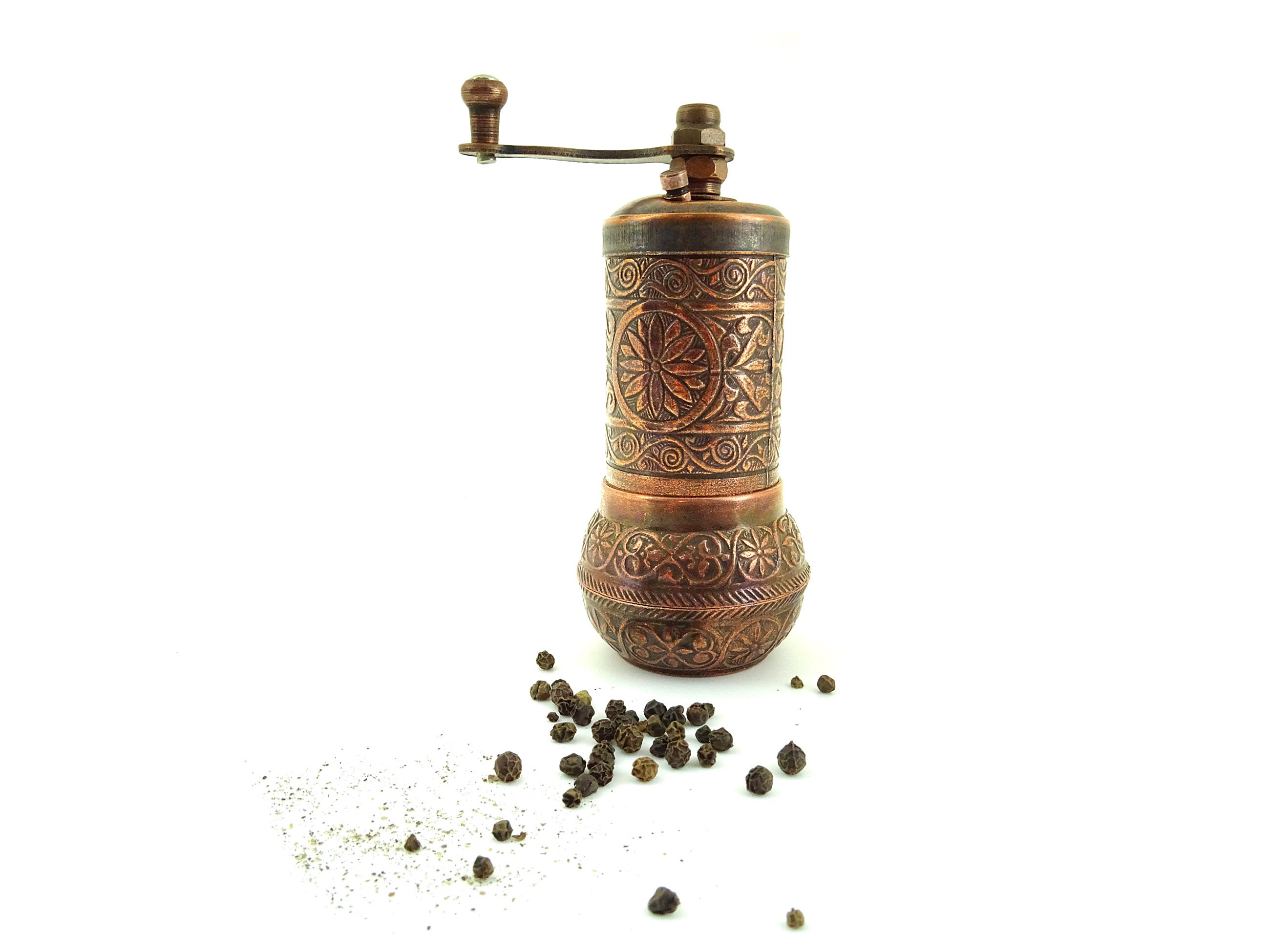 Kitchen spice hand mill and bronze muller grinder on wooden background  Stock Photo - Alamy