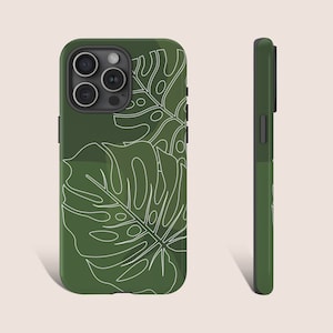 May include: A green phone case with a white outline of tropical leaves. The case has a camera cutout and a black border.