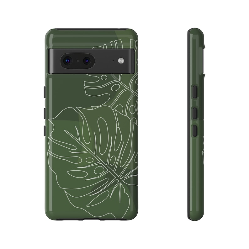 May include: A green phone case with a white outline of tropical leaves. The case has a camera cutout and a cutout for the phone's buttons.