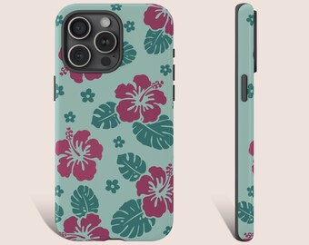May include: A teal blue phone case with a floral pattern of pink hibiscus flowers and green leaves. The case has a black camera cutout and a black border.