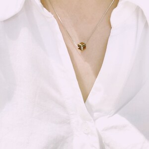 Collier cube doré en pyrite