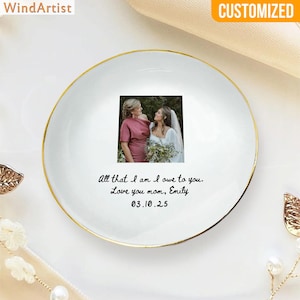 May include: A white ceramic dish with a gold rim, featuring a photo of two women. The dish has the text "All that I am I owe to you. Love you mom, Emily 03.10.25". The word "CUSTOMIZED" is in the top right corner.