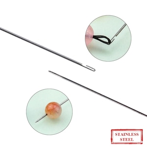 May include: Two stainless steel bead threading needles with a loop at one end. The needles are shown threading beads and a loop of elastic.