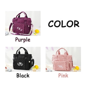 May include: A set of diaper bags in purple, black, and pink. Each bag has a quilted front pocket and a shoulder strap. The bags are labeled with the colors and have initials embroidered on them. The word "COLOR" is written in black.