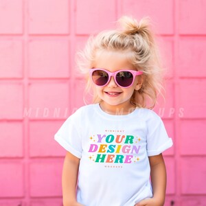 Children&#39;s White T-Shirt Mockup - Colorful Bright Fun Back to School Pink Doll Theme Holding Smoothie