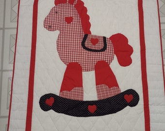 Traditional Rocking horse crib quilt