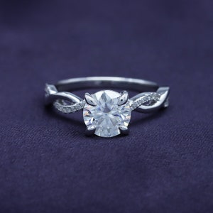 1.50 Carat Round Cut Lab Created Moissanite Diamond Twisted Split Shank Engagement Ring in 10K Gold or 14K Gold and Sterling Silver