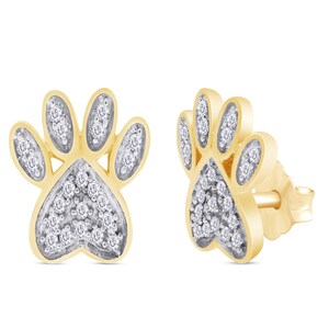 May include: A pair of gold-tone paw print earrings with small diamonds set in the paw print design.