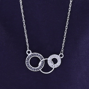 1/10 Carat Black & White Natural Diamond Interlocking Circle Pendant Necklace in 10K Gold or 14K Gold and Sterling Silver