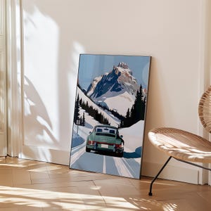 May include: A vintage green Porsche 911 driving on a snowy mountain road. The car is driving towards a snow-capped mountain peak in the background. The road is lined with trees on either side.