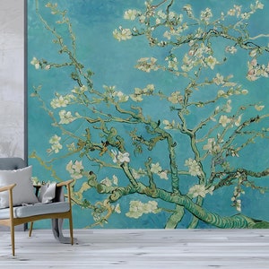 Puede incluir: Una pintura de un almendro en flor con flores blancas sobre un fondo de cielo azul. La pintura está realizada en un estilo que recuerda al de Vincent van Gogh.