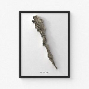 May include: A black and white topographic map print of Capitol Reef National Park. The map is framed in a black frame and has a white background.