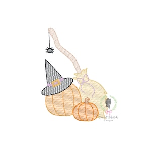 May include: Embroidered design featuring a witch's hat, broom, and two pumpkins. The broom is tied with a purple ribbon and has a spider hanging from it. The design is perfect for Halloween crafts.