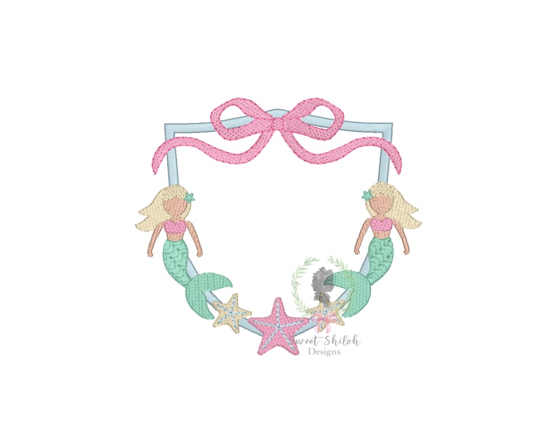 May include: A light blue frame with a pink bow and two mermaids on either side. The mermaids have blonde hair, pink tops, and green tails. There are starfish and seashells around the mermaids.