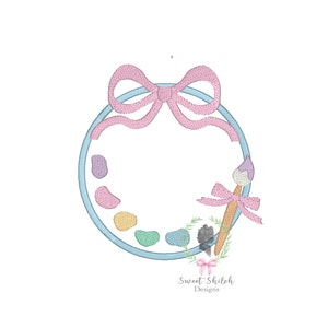 May include: A blue and white paint palette with a pink bow and a paintbrush with a pink bow. The palette has six paint wells with different colors of paint.