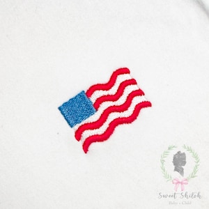 May include: Embroidered American flag patch featuring red and white stripes and a blue square with white stars. The flag is stitched on a white background. The design is suitable for patriotic crafts and apparel.