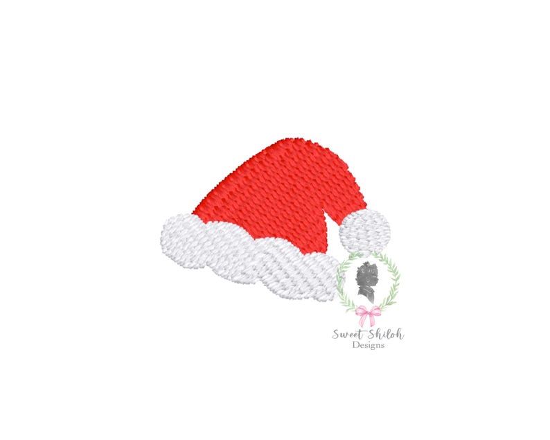 May include: Red and white embroidered Santa hat with a white pom-pom. The hat is tilted to the side.