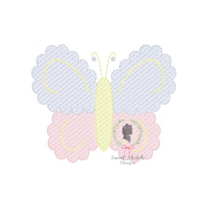 May include: A pastel pink, yellow, and blue butterfly embroidery design with scalloped edges. The butterfly has a wreath around its center with a silhouette of a person inside.