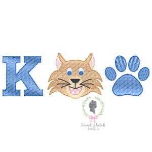 May include: Blue and brown embroidered design with the letter K, a cartoon cat face, and a paw print. The design is for a personalized item.