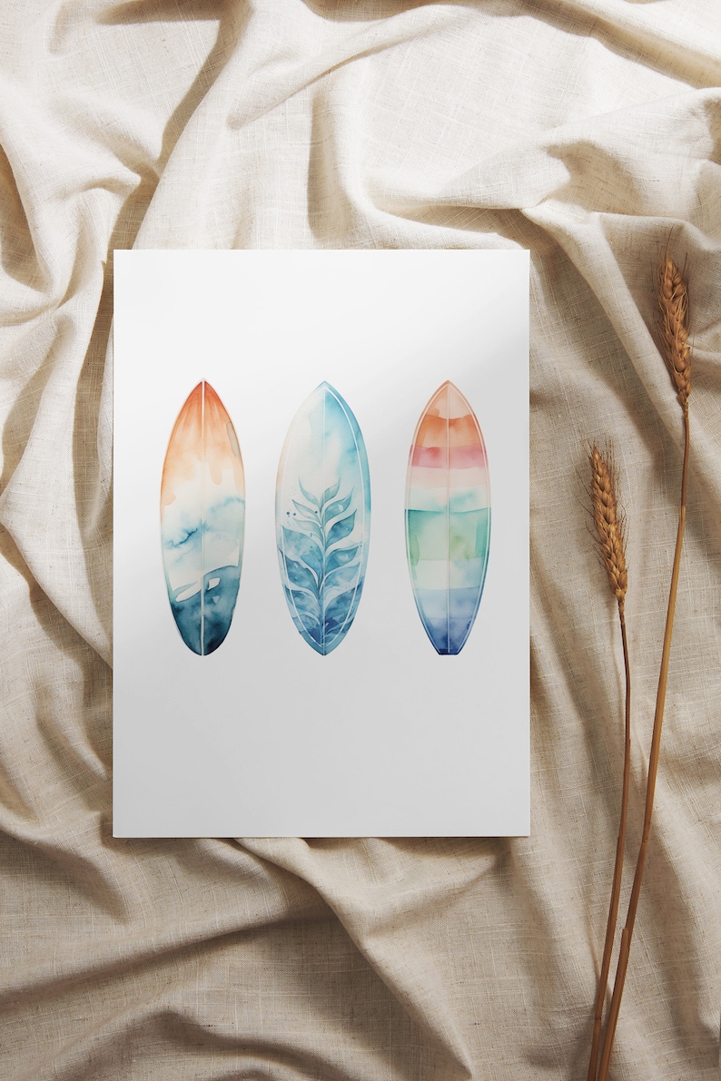 May include: Three watercolor paintings of surfboards with different designs. The surfboards are painted in shades of blue, green, and orange.