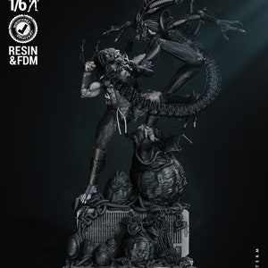 May include: A detailed grayscale resin statue depicting a battle between a Predator and an Alien. The statue features intricate details, with the Alien towering over the Predator. The base includes Alien eggs and the text "WICKED" and "NEXT TERM".