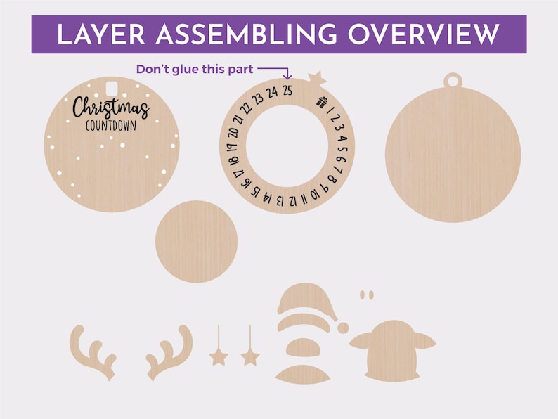 May include: A Christmas countdown ornament craft kit featuring a wooden circle, a ring with numbers 1 to 25, and reindeer antlers. The kit also includes a star, a hat, and a face for a snowman.