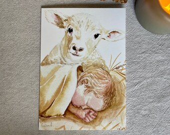 May include: Watercolor painting of a baby sleeping with a white lamb beside them. The baby is wrapped in a brown blanket and the lamb is looking at the viewer.