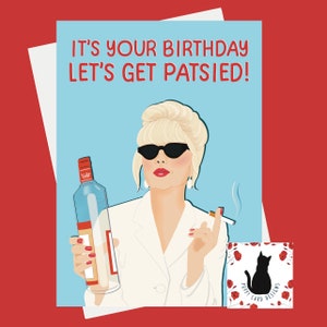 May include: A birthday card featuring a cartoon illustration of a woman with blonde hair, wearing sunglasses and a white blazer, holding a bottle of vodka and a cigarette. The text on the card reads "It's your birthday let's get Patsied!"