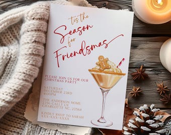 May include: A white party invitation card featuring the red and gold text 'Tis the Season for Friendsmas' and an illustration of a cocktail in a martini glass topped with whipped cream and a gingerbread man cookie.